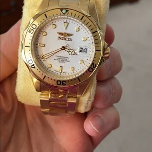 Invicta gold men's watch.